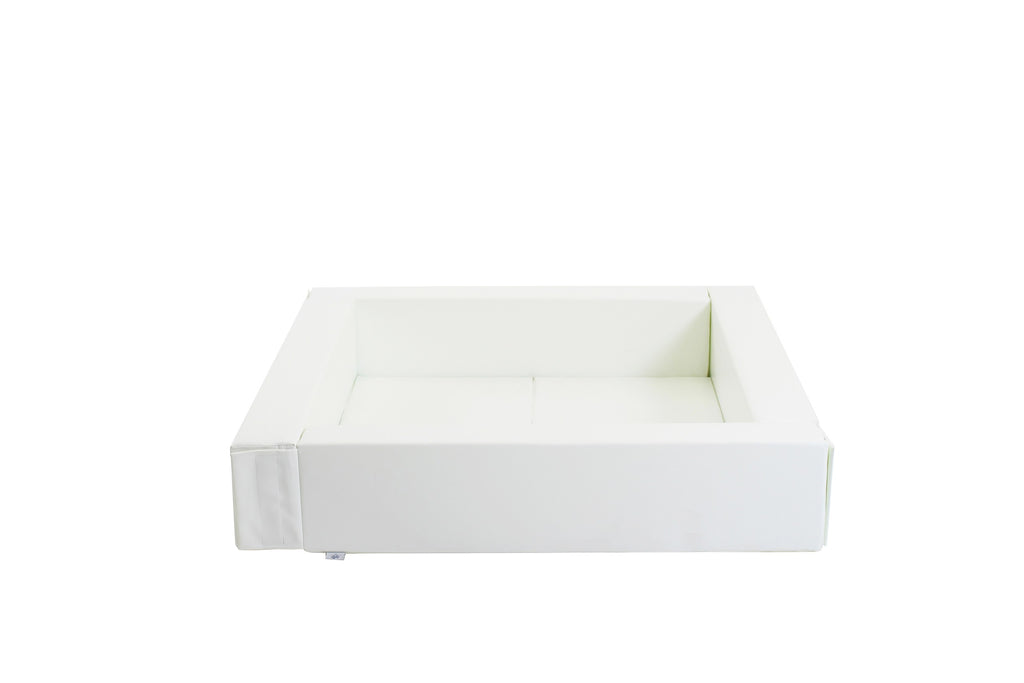 elegant white iglu soft play ball pit in a minimalist nursery setting