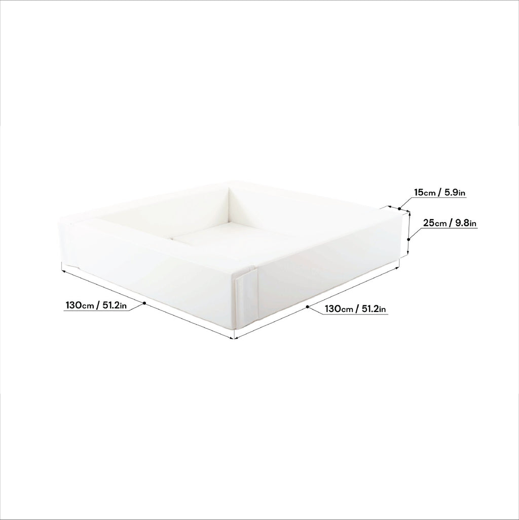white iglu soft play ball pit set up in a bright playroom, showcasing its portable and practical design for toddlers