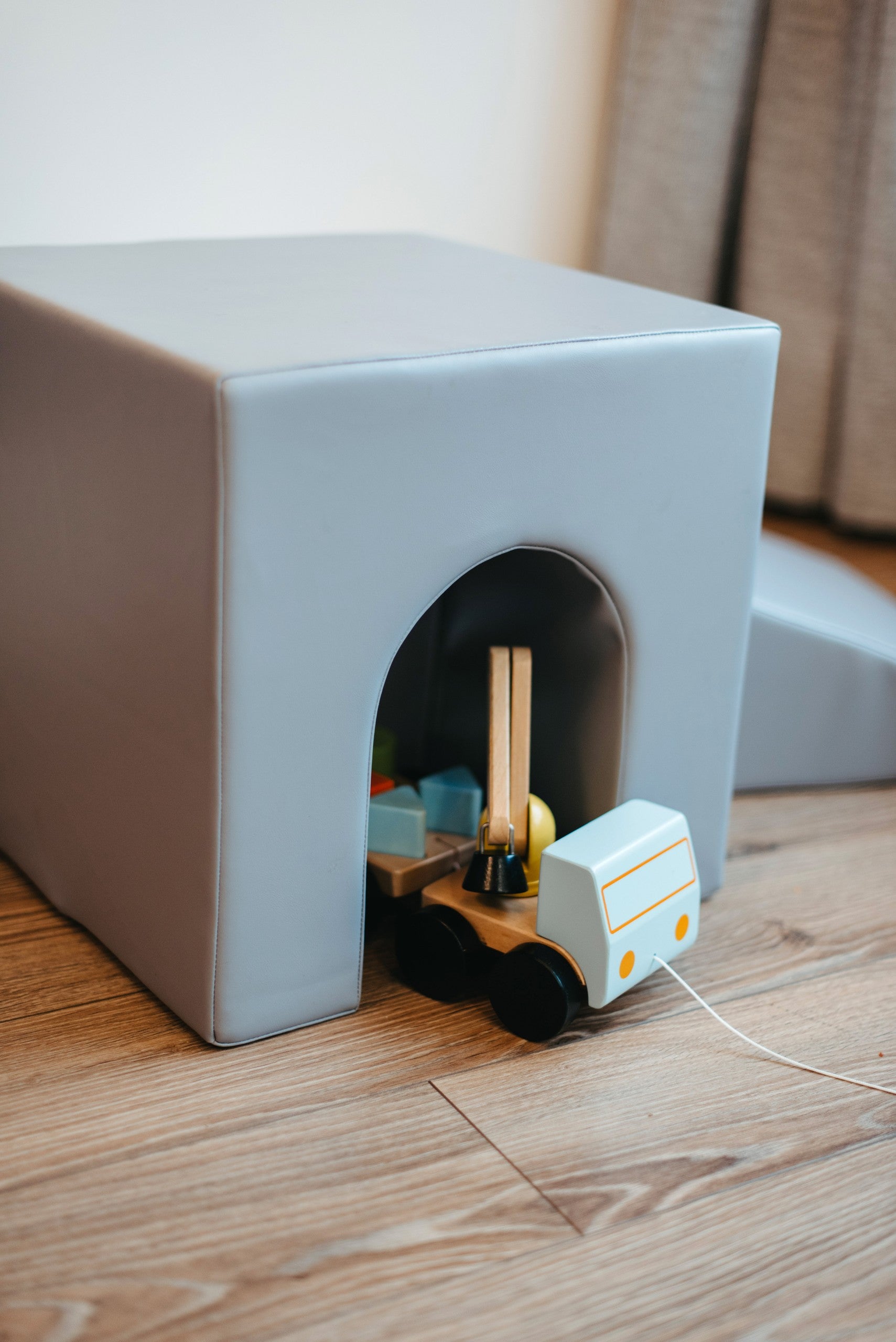 grey and white iglu foam blocks arranged in a creative castle structure for kids