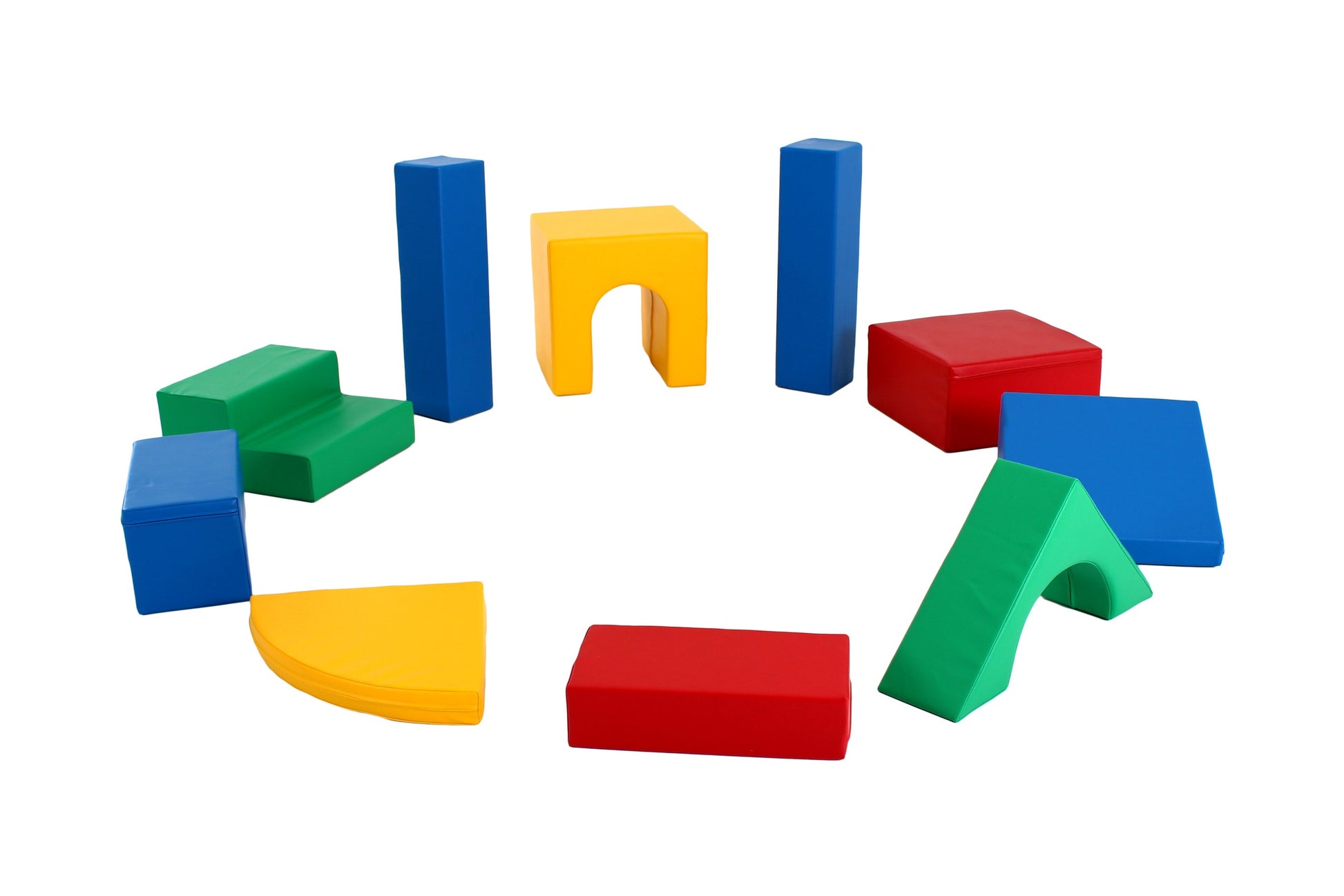 a child's hand placing a vibrant red iglu foam block on top of a tower