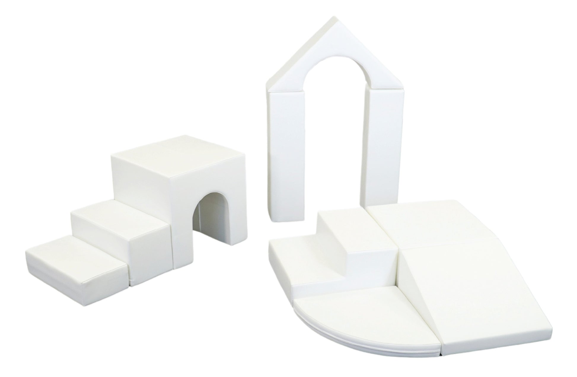 a child building a creative fort with white iglu foam blocks