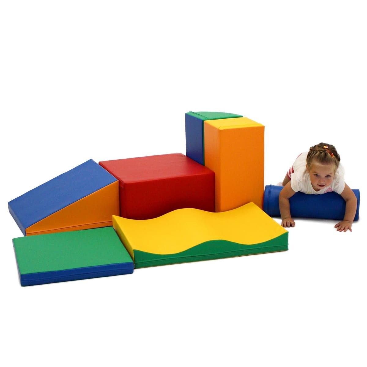 a child's hand building a vibrant iglu foam block tower in a sunlit playroom