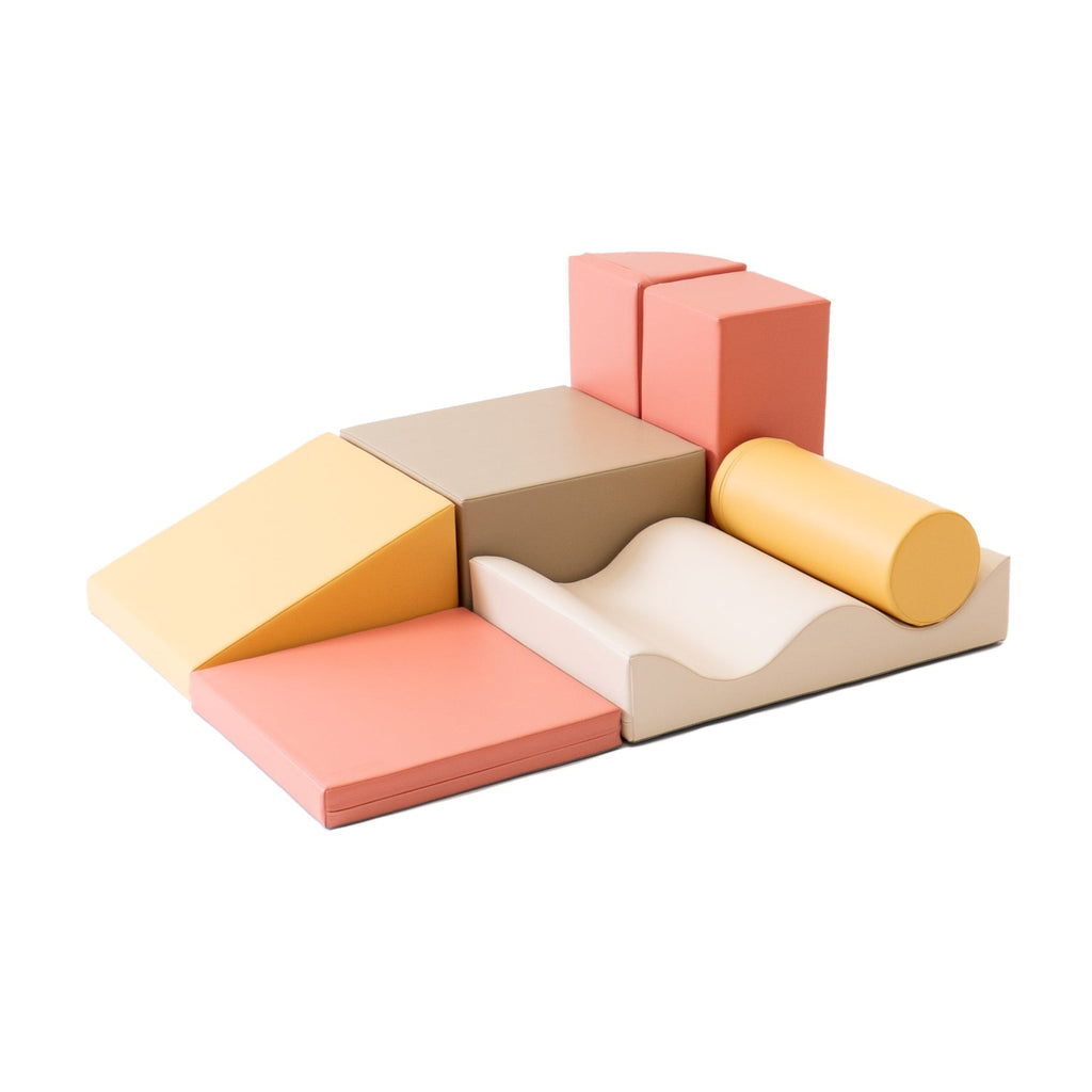 soft pastel pink iglu foam blocks arranged in a gentle stack for a baby's nursery
