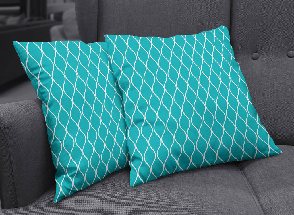 Turquoise Throw Pillow with White Geometric Design