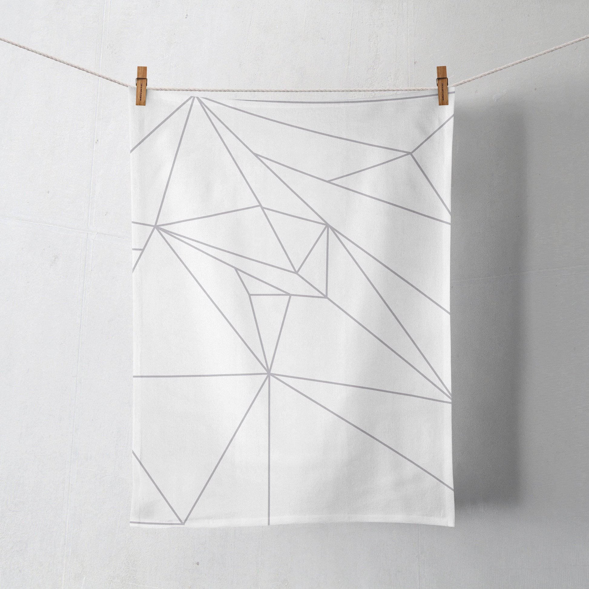 White Tea Towel with a Grey Geometric Design