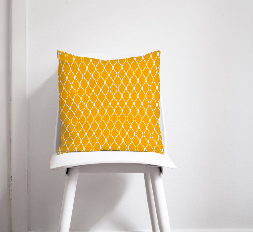 Yellow Throw Pillow with White Geometric Design