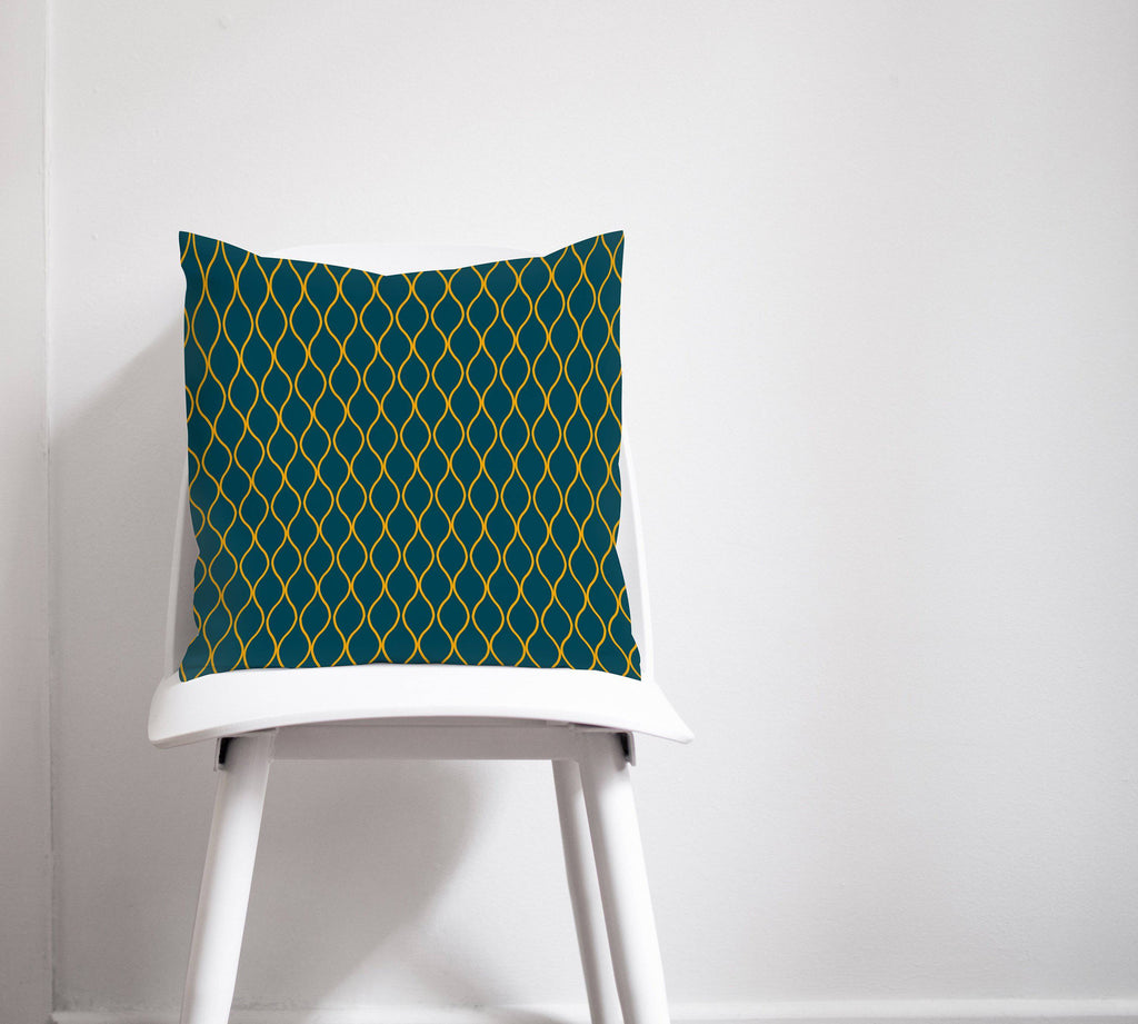 Teal Throw Pillow with Yellow Geometric Design