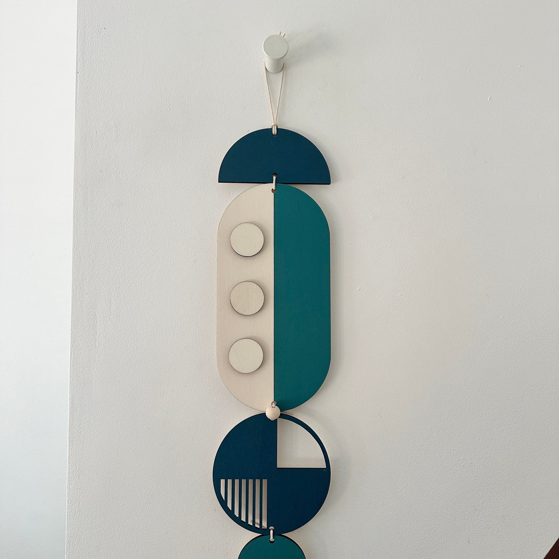 Blue Geometric Wall Art Hanging in Modern Minimal Style