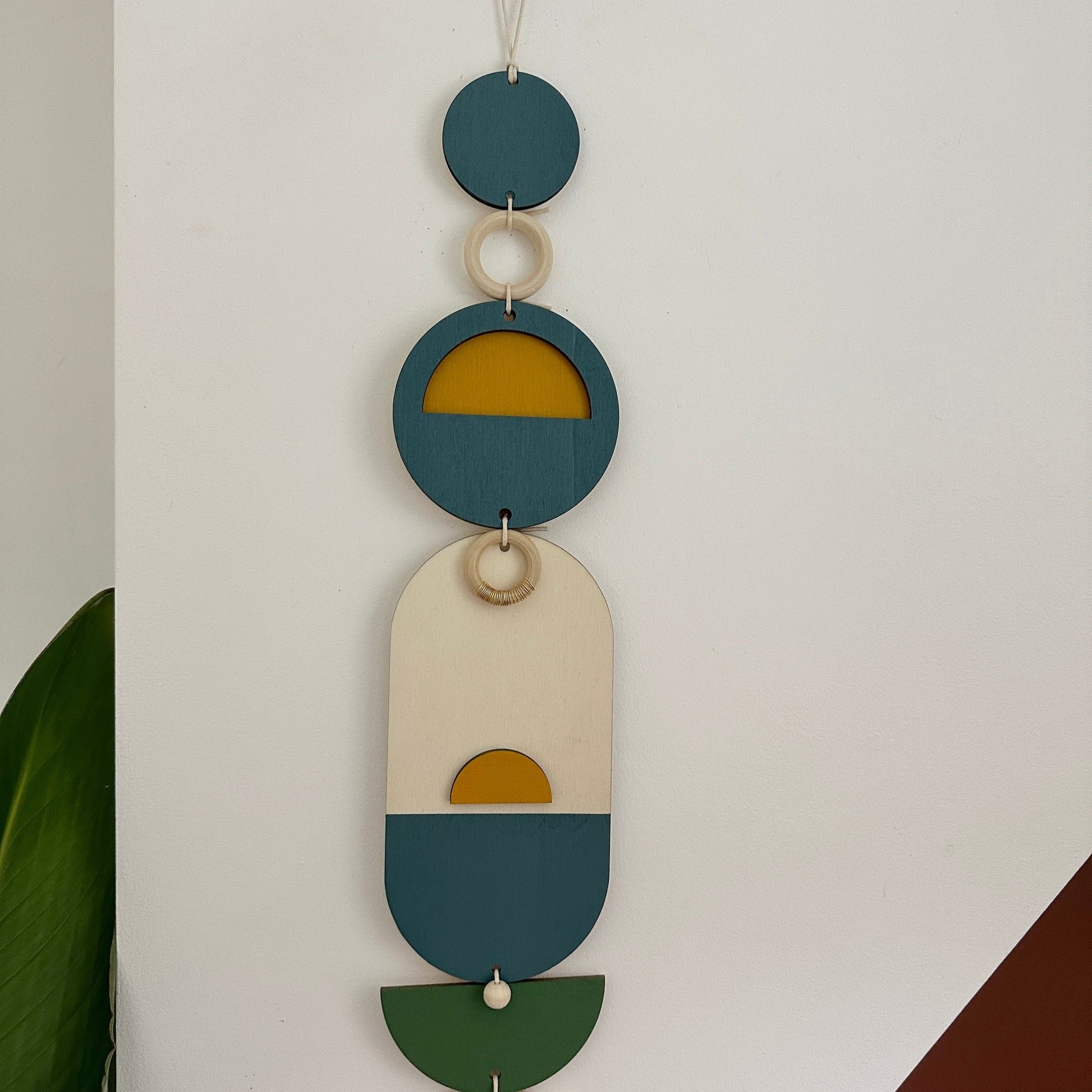 Modern Geometric Wall Hanging with Gold Metal Details