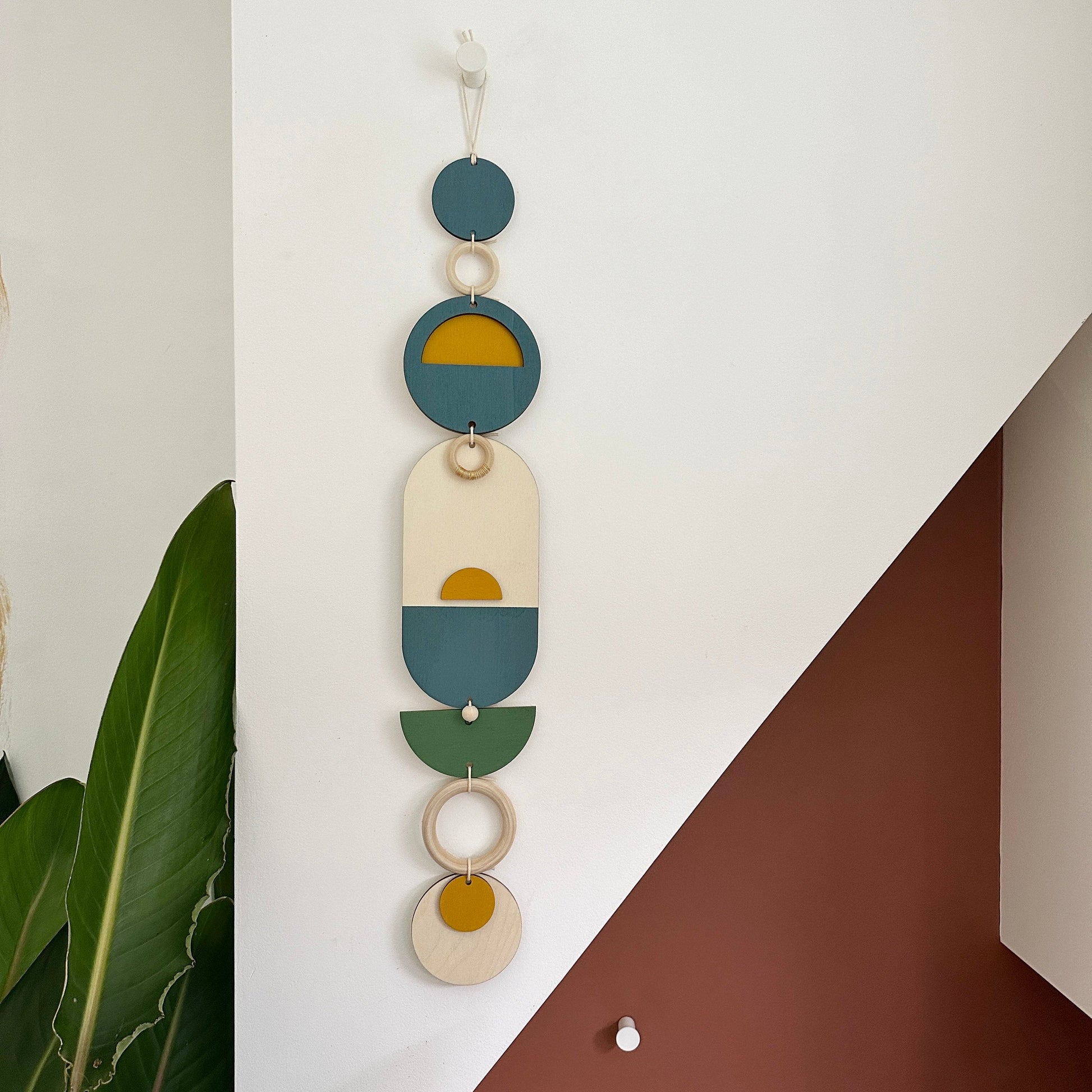 Modern Geometric Wall Hanging with Gold Metal Details