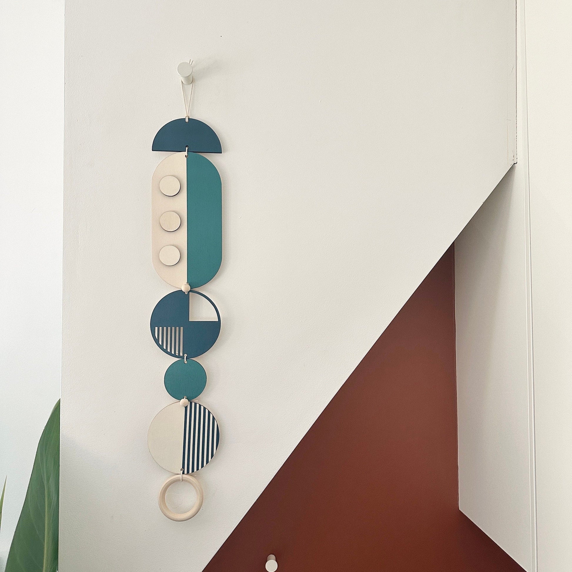 Blue Geometric Wall Art Hanging in Modern Minimal Style