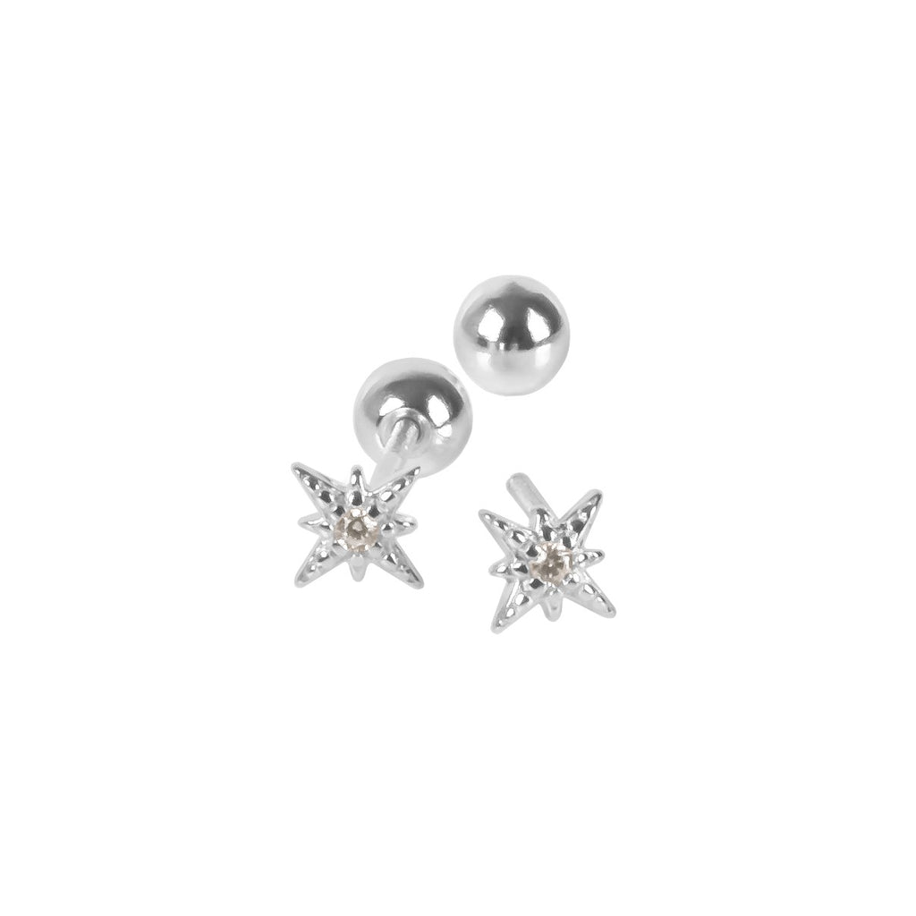 bold close-up of sterling silver star xs screw back earrings with brilliant zircon sparkle