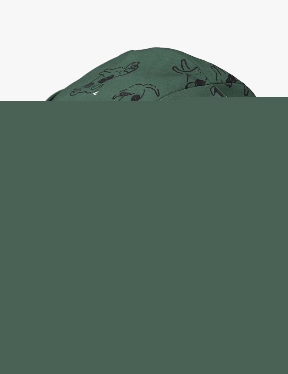 close-up of a playful green kids beanie with a happy dog print, worn slouchy