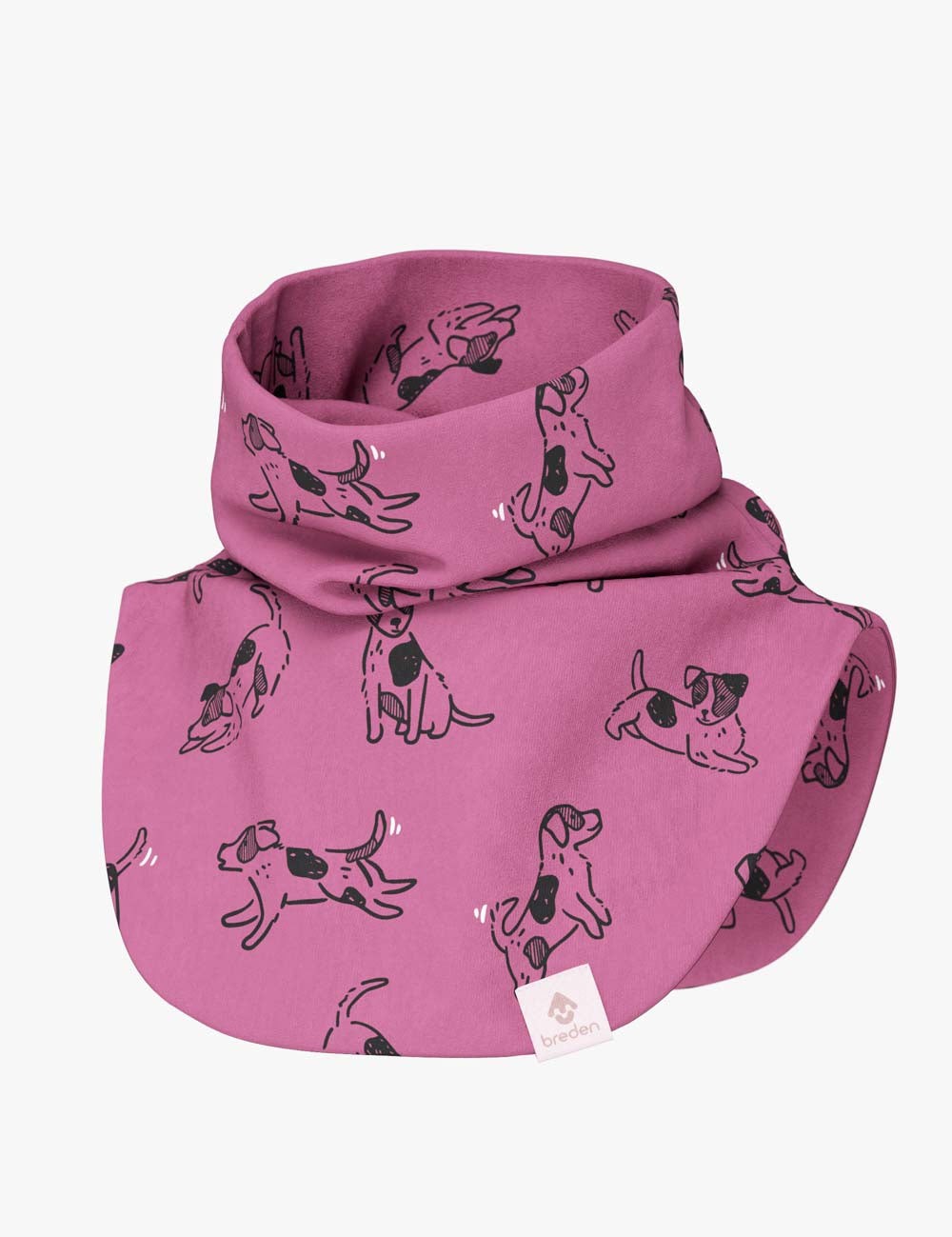 a playful pink dogs print kids neck warmer in soft cotton, shown on a playful adventure