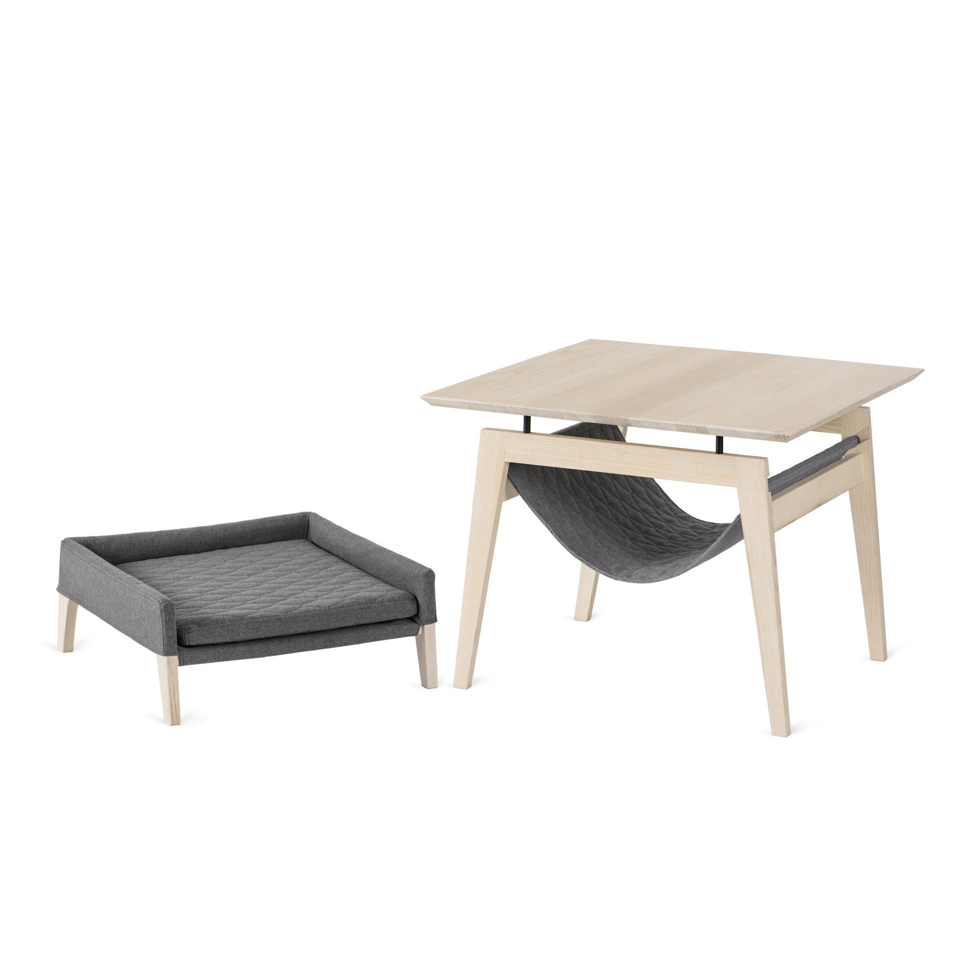 bold light grey kikko cat table and lulu bed in a modern living room setting