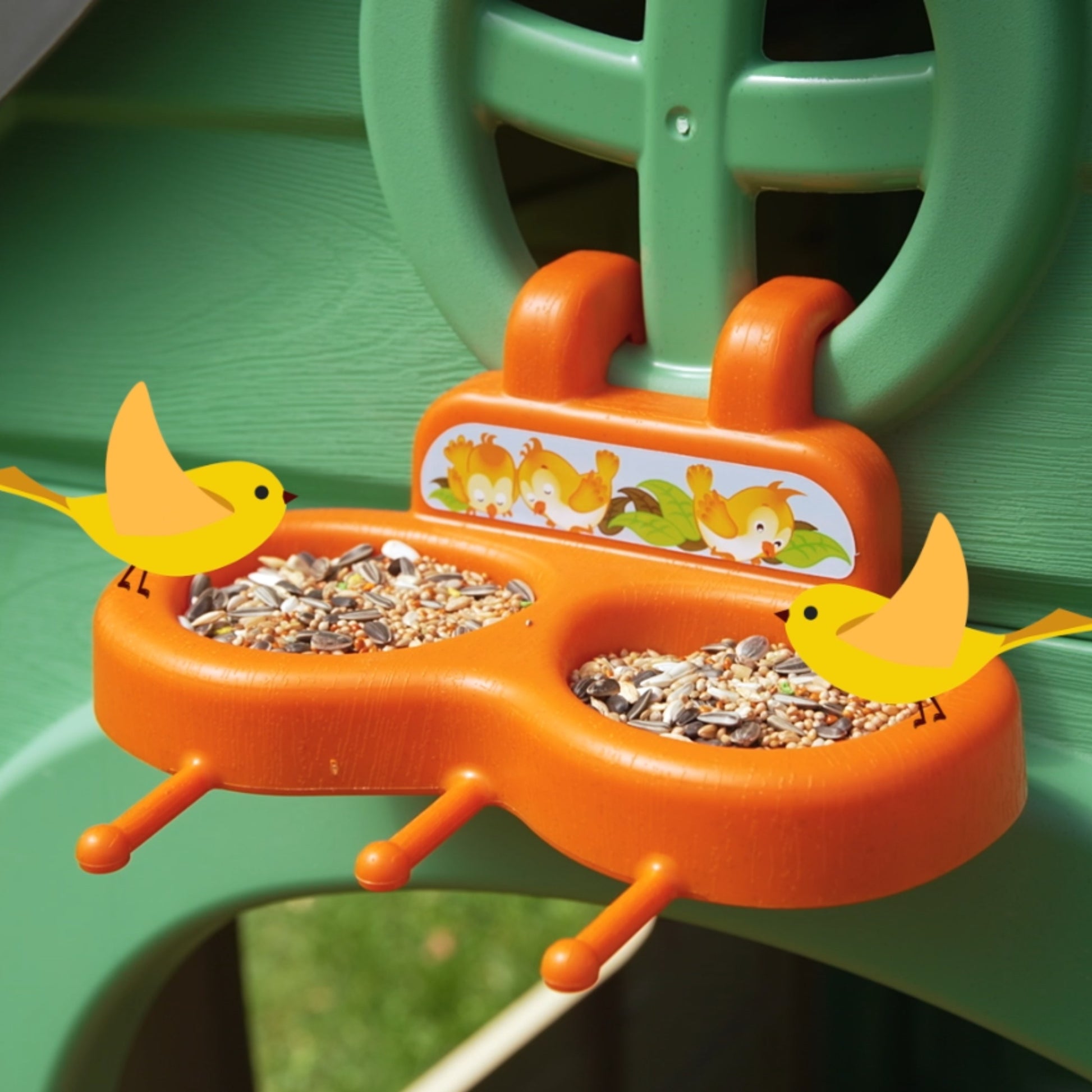 kids playing in a recycled eco playhouse with wind turbine and solar panels under golden sunlight