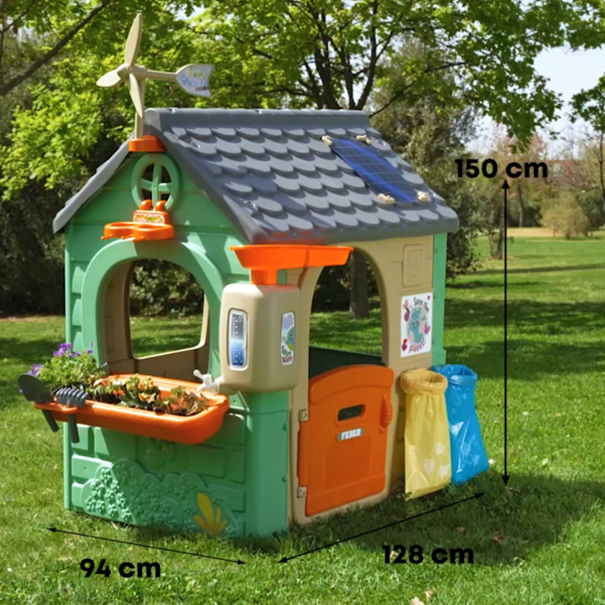 kids playing in a recycled eco playhouse with wind turbine and solar panels under golden sunlight