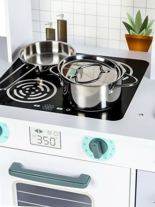 a practical view of the wooden play kitchen's removable sink and included cooking utensils