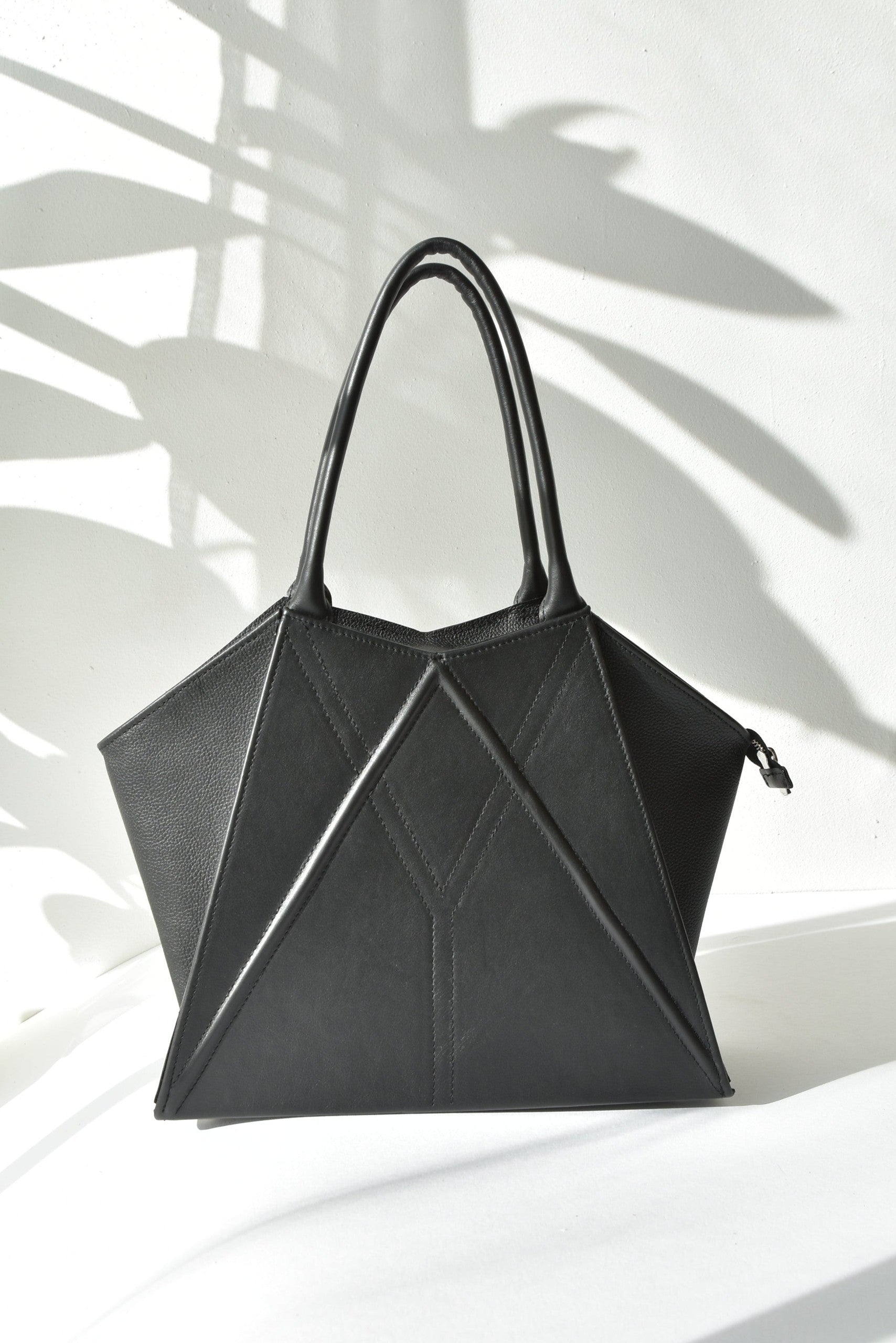 elegant handmade leather tote bag by gerda retter with magnetic closure and inner pocket
