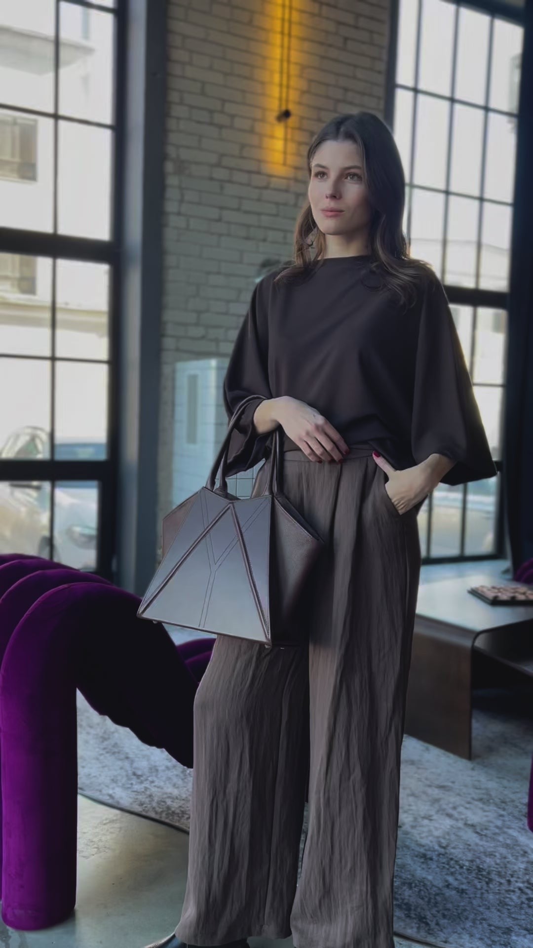 gerda retter handmade leather tote bag with magnetic closure in warm morning light