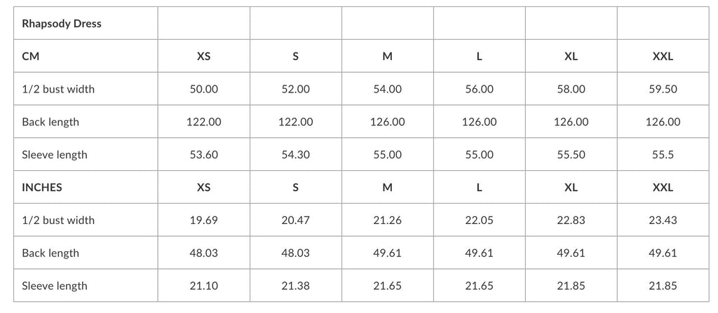 soft black linen rhapsody dress with a relaxed fit and side slits, shown in comforting natural light