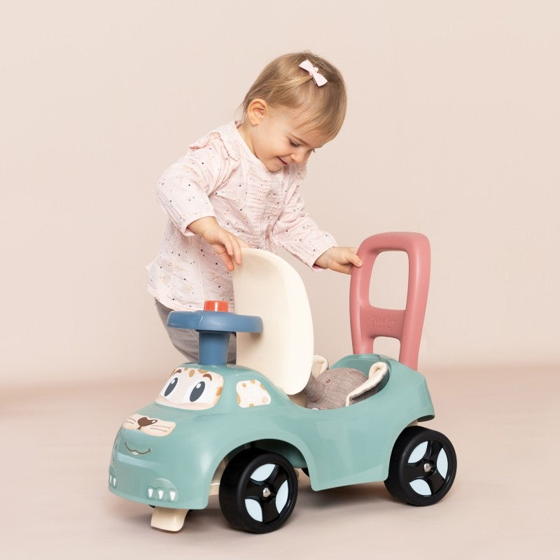soft pastel ride-on pusher with horn, perfect for toddlers learning to walk in a cozy home setting