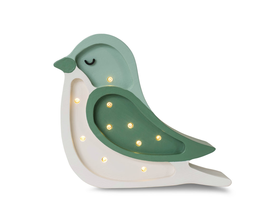 handmade pine wood bird lamp casting a soft, warm glow on a nursery shelf