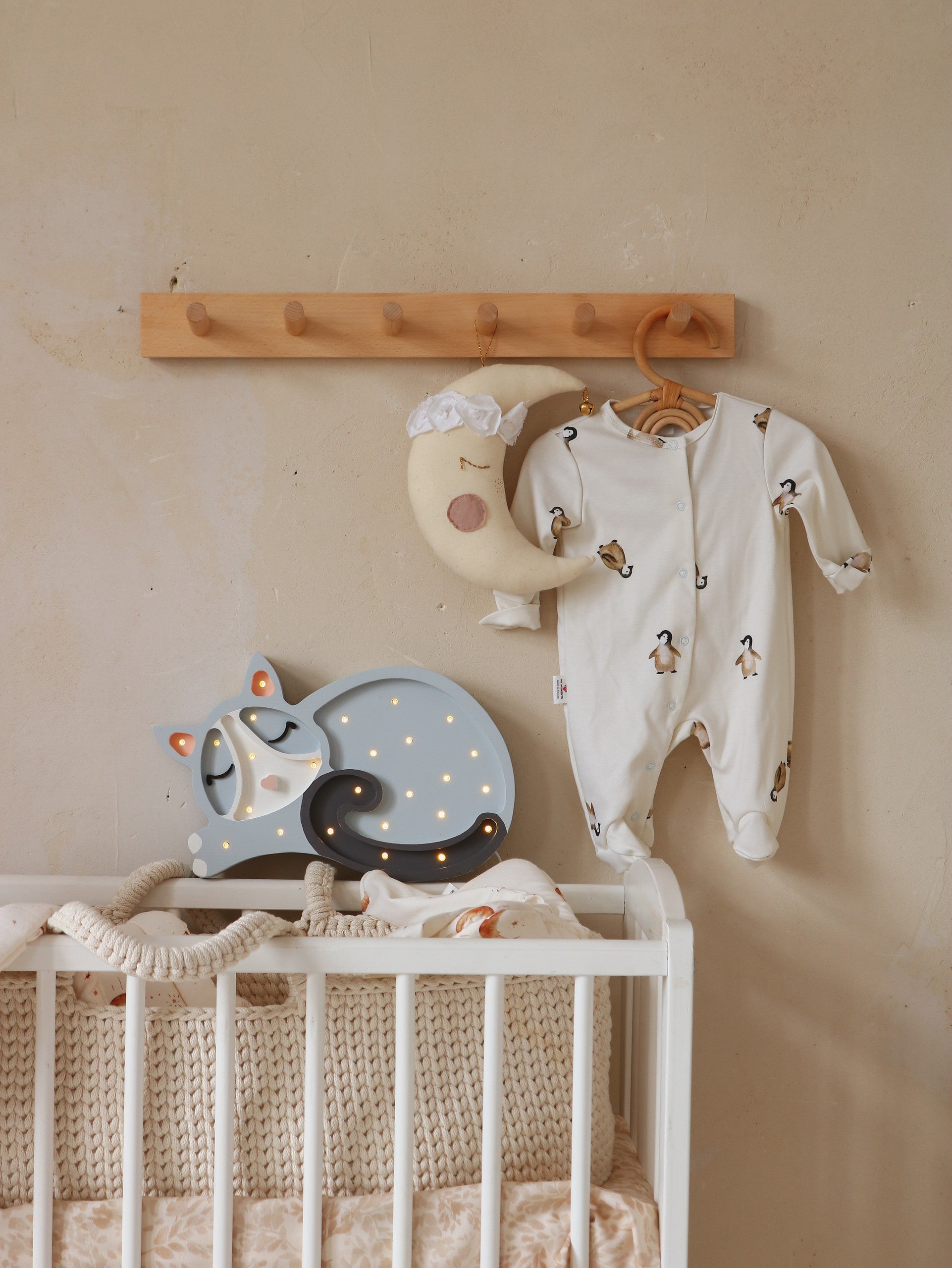 functional little lights cat lamp on a nightstand with remote control for setting the timer