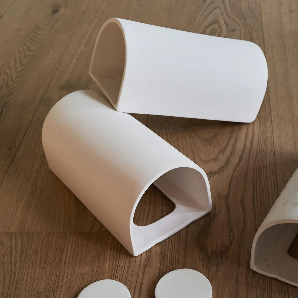 a practical close-up of the curve ceramic wall sconce showing its matte white finish and installation details for a hallway