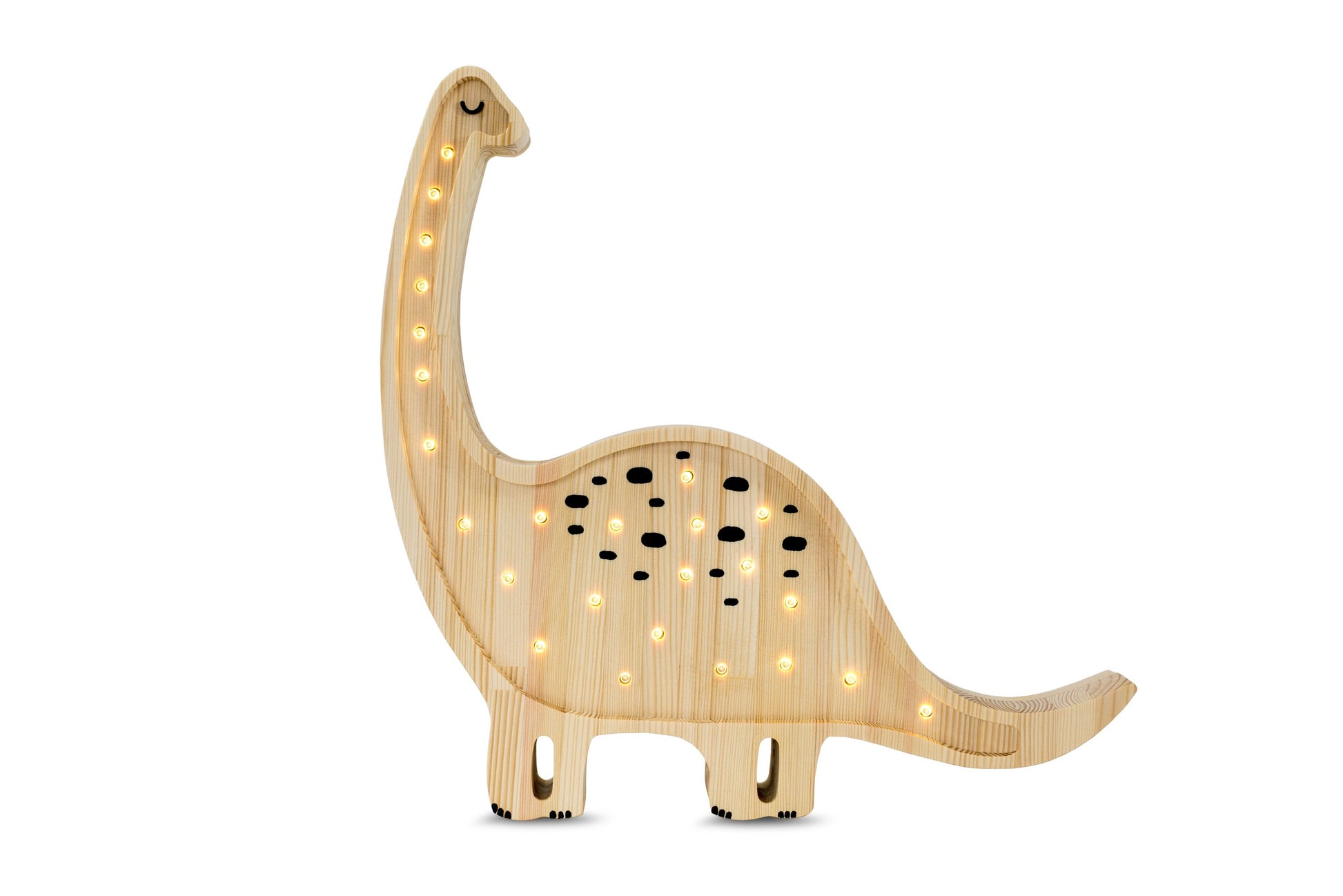 handmade pine diplodocus lamp casting a soft comforting glow on a nightstand