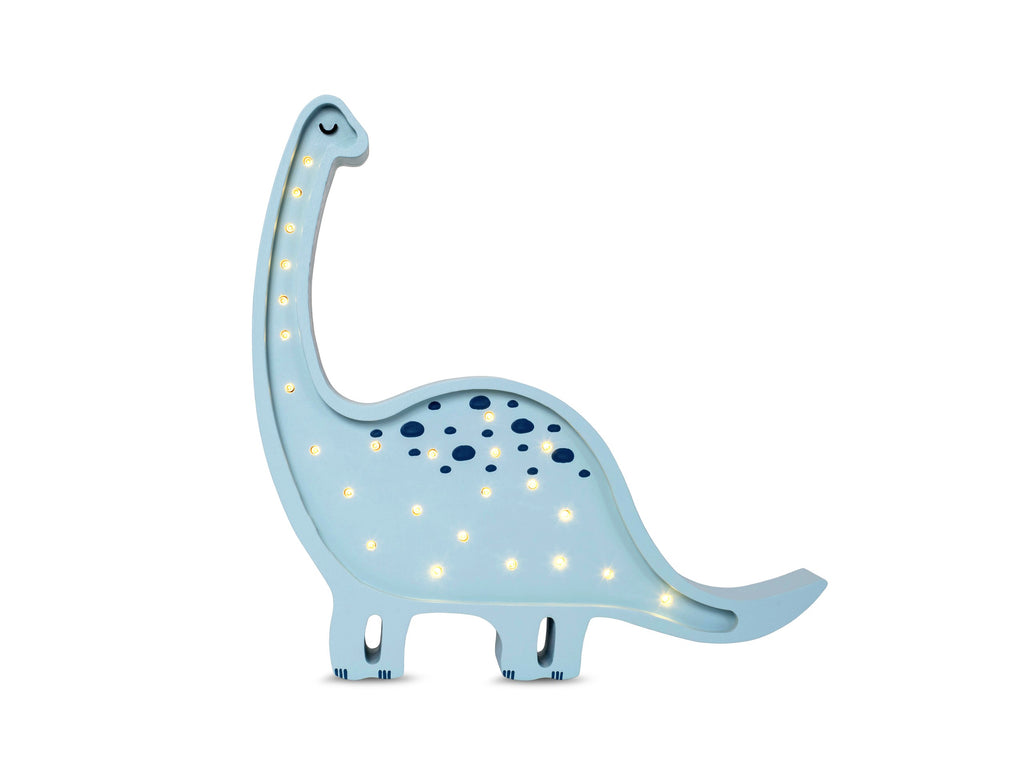 diplodocus lamp casting a warm glow on a nightstand in a child's room