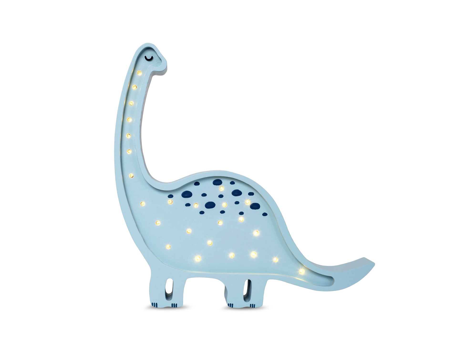 diplodocus lamp casting a warm glow on a nightstand in a child's room