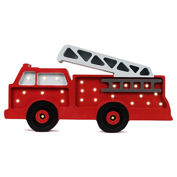 playful pine wood firetruck lamp casting a warm glow on a child's nightstand