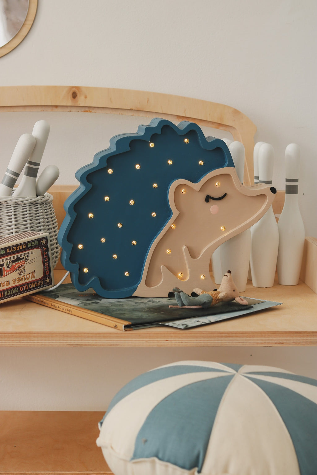 handcrafted pine wood hedgehog night lamp with adjustable dimmer and timer on a bedside table