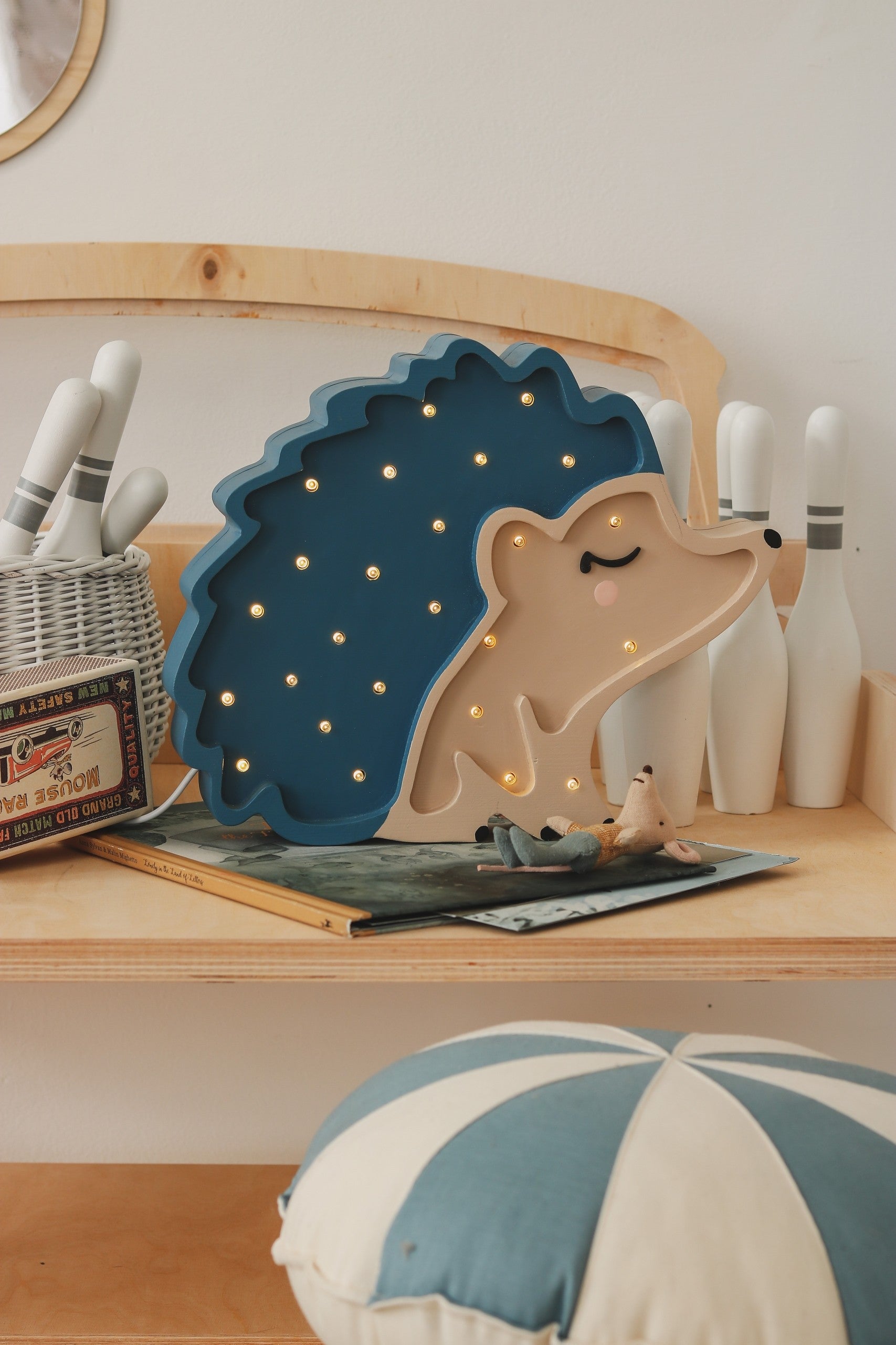 handcrafted pine wood hedgehog night lamp with adjustable dimmer and timer on a bedside table