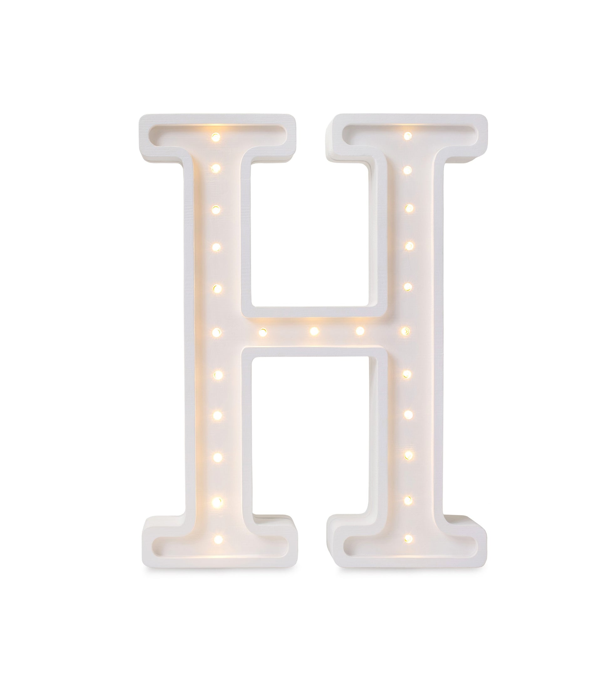 softly glowing letter h lamp casting a warm, comforting glow on a nursery shelf