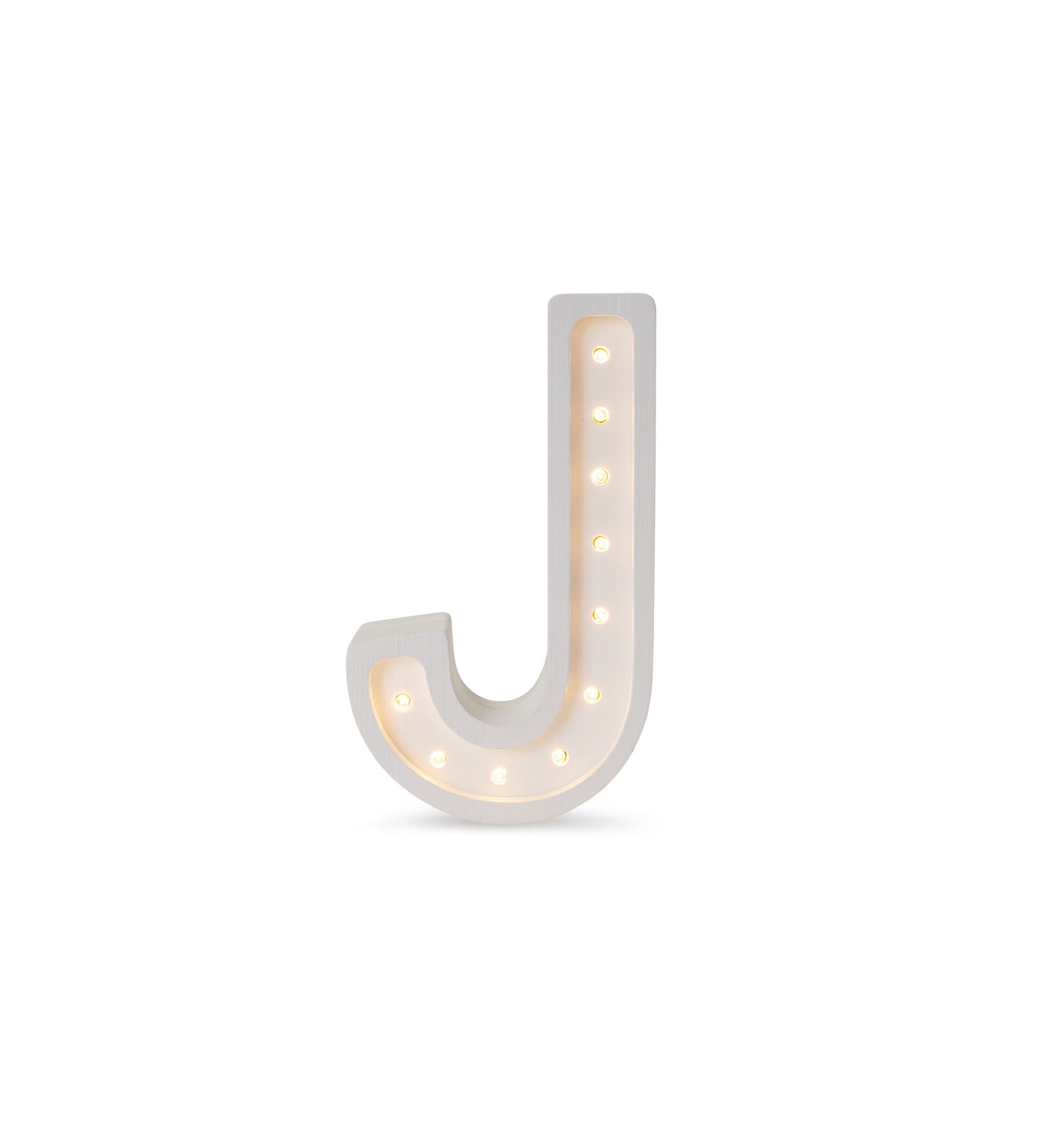 bold artisan-crafted letter j lamp glowing warmly in a modern nursery