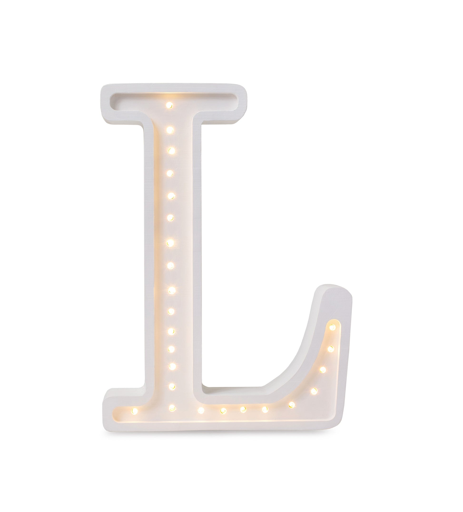 soft glow from a handmade pinewood letter l lamp on a childs nightstand
