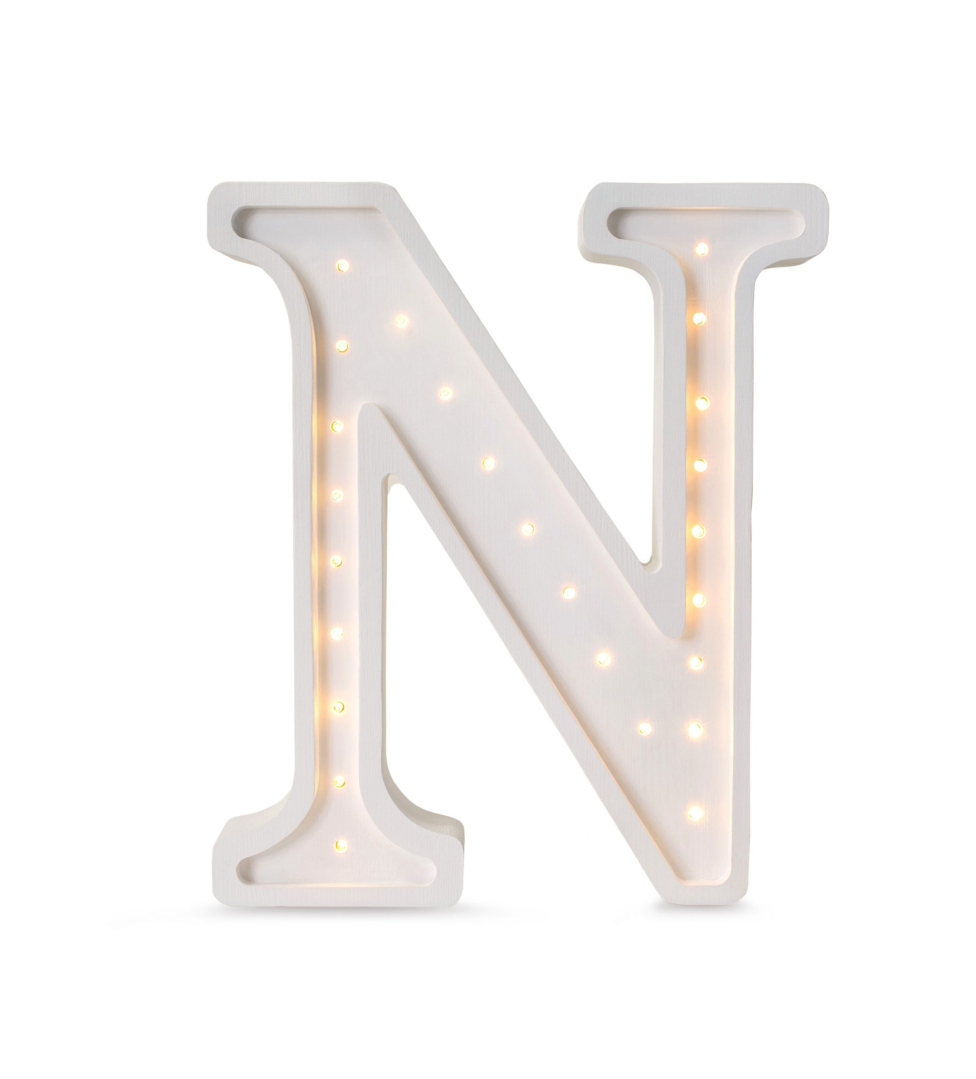 softly glowing letter n lamp casting a warm, comforting light in a cozy nursery