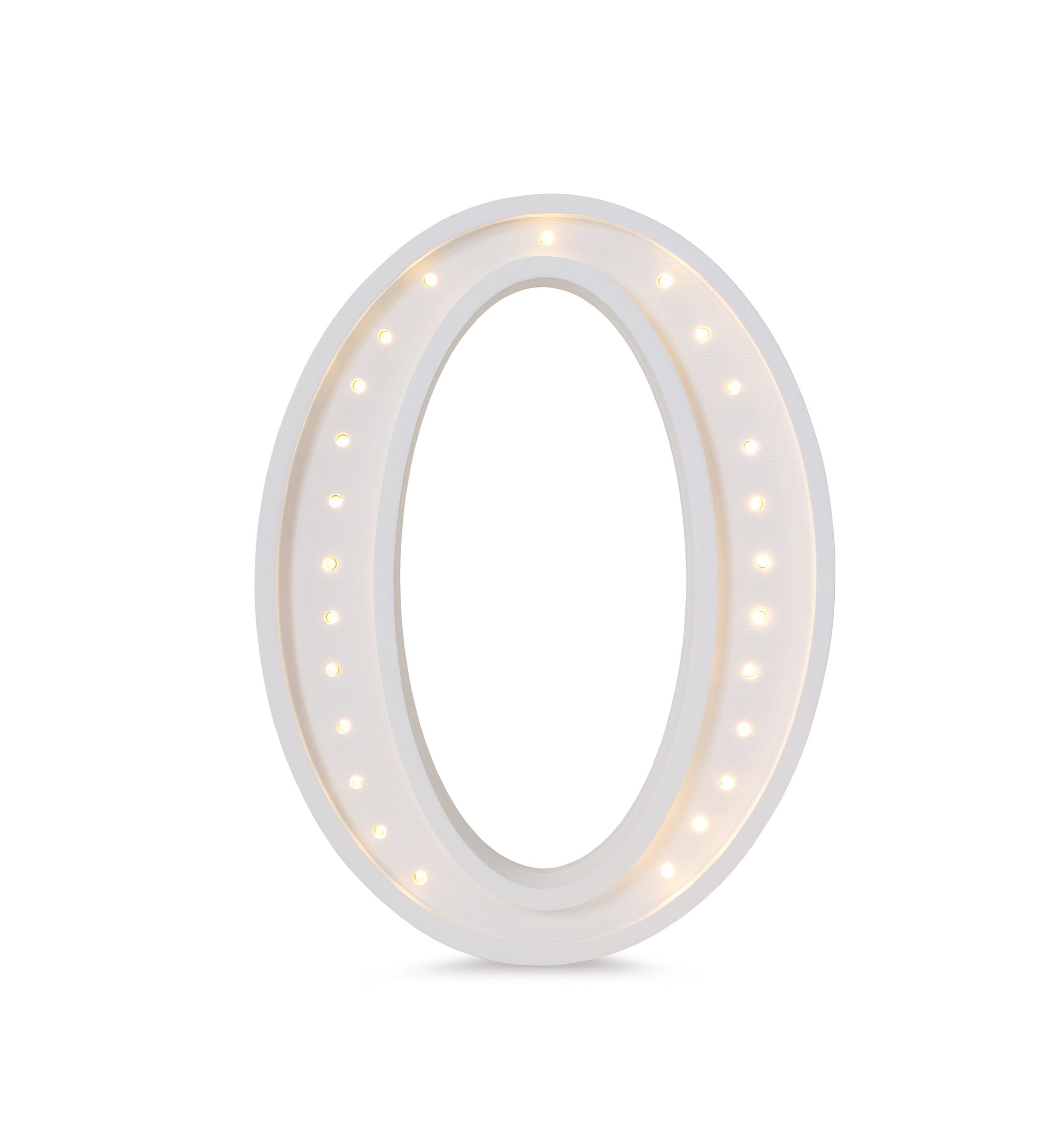 a soft-glow letter o lamp casting a warm, comforting light on a nursery shelf