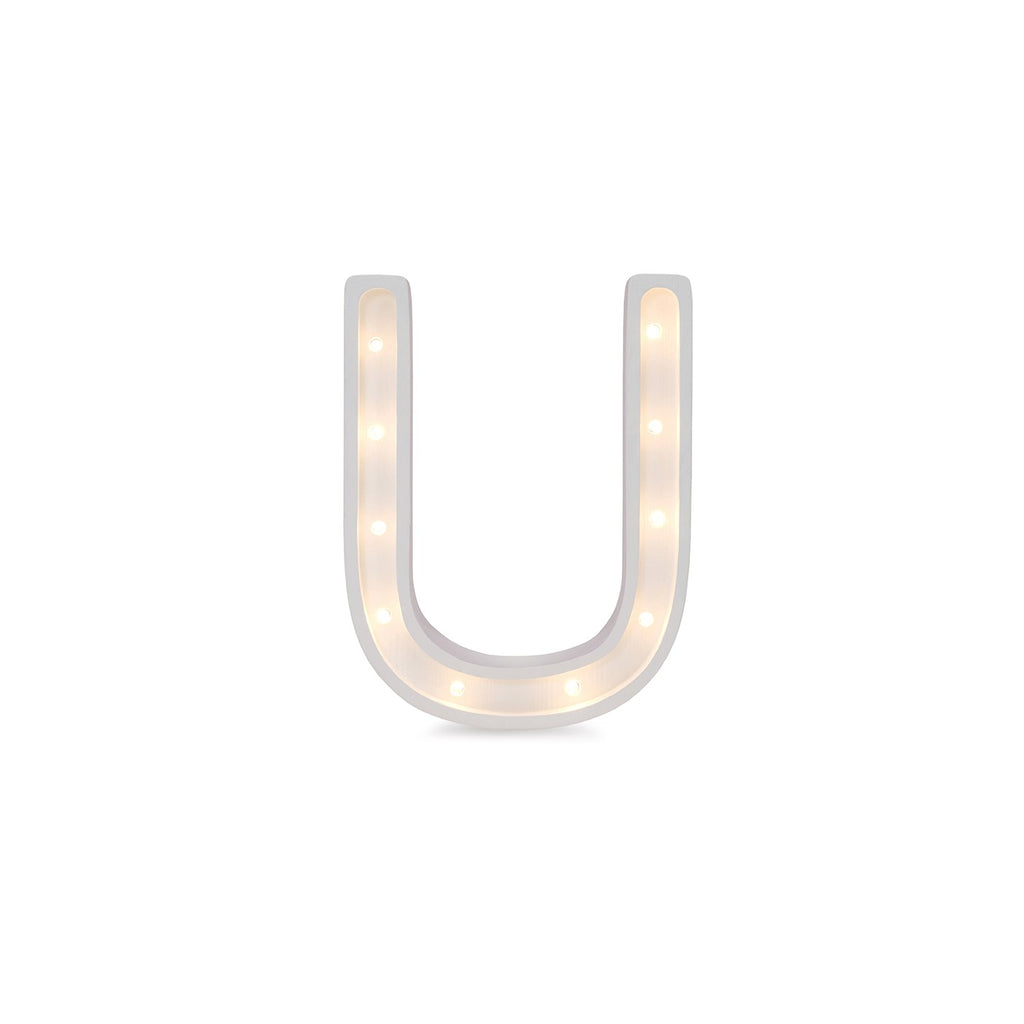 bold solid pinewood letter u lamp casting a warm glow in a child's room