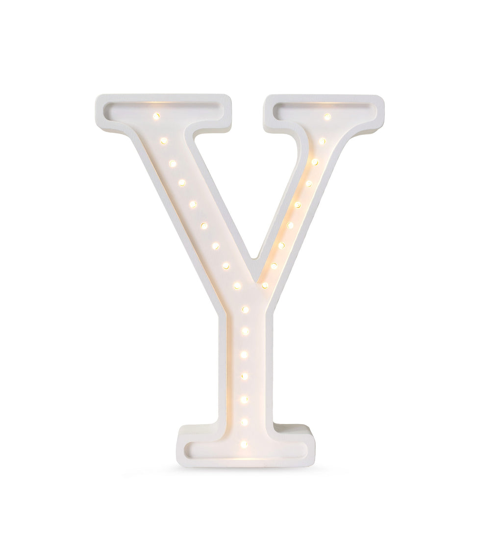 a soft glowing letter y lamp casting a warm, comforting light in a cozy nursery