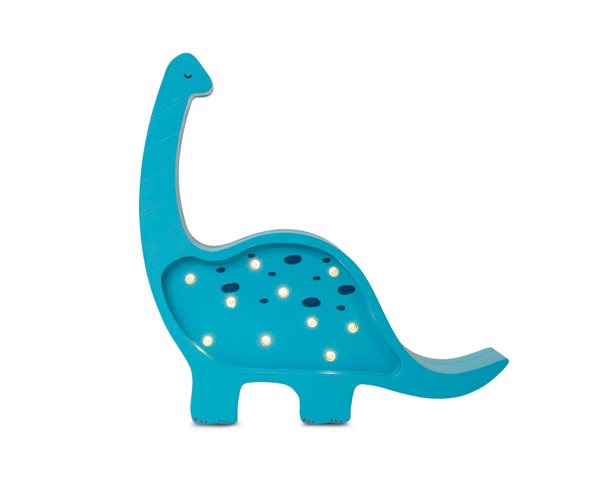 softly lit mini dino lamp casting a warm glow on a bedside table