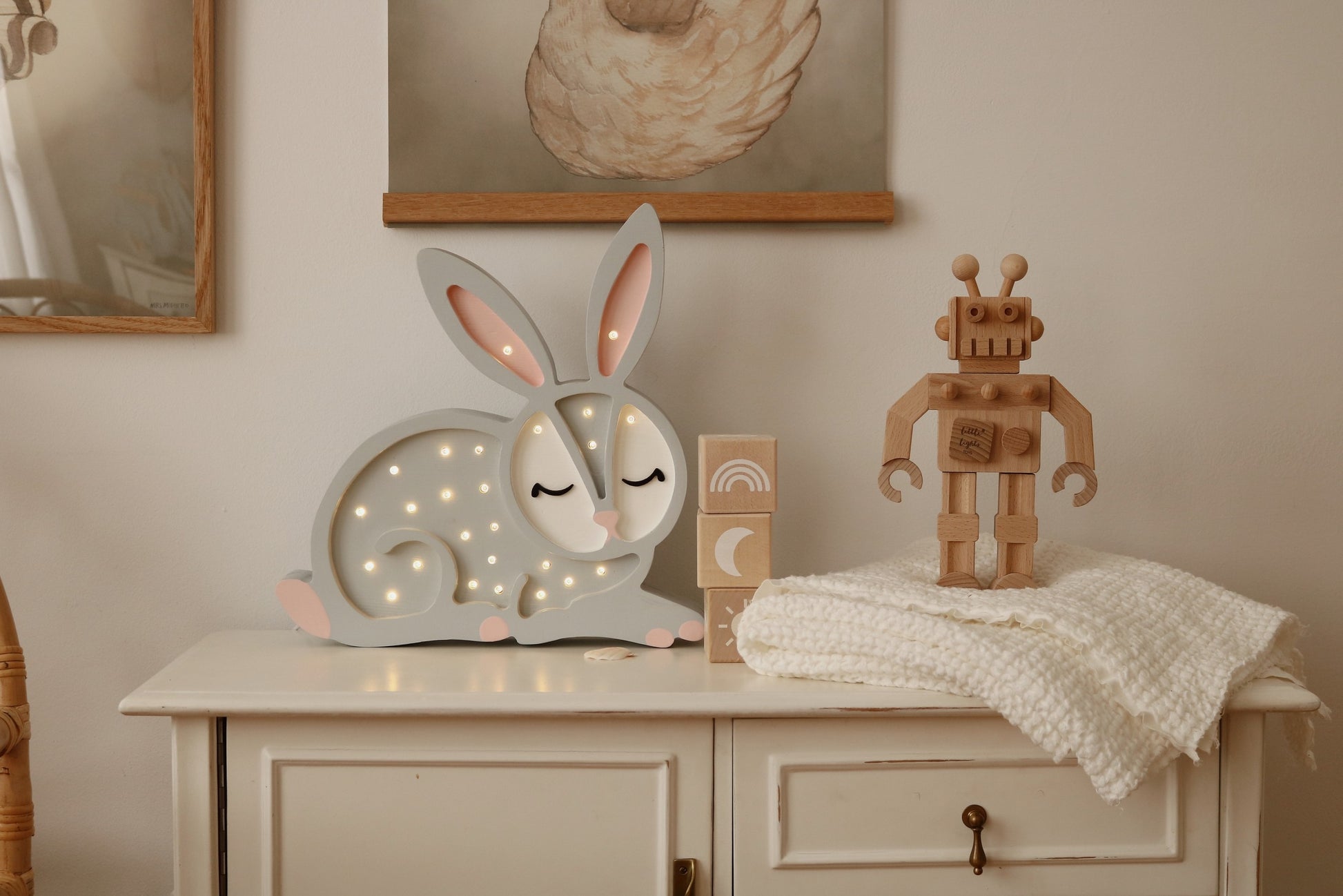 bold bunny lamp glowing warmly on a modern shelf, a confident statement piece for a child's room