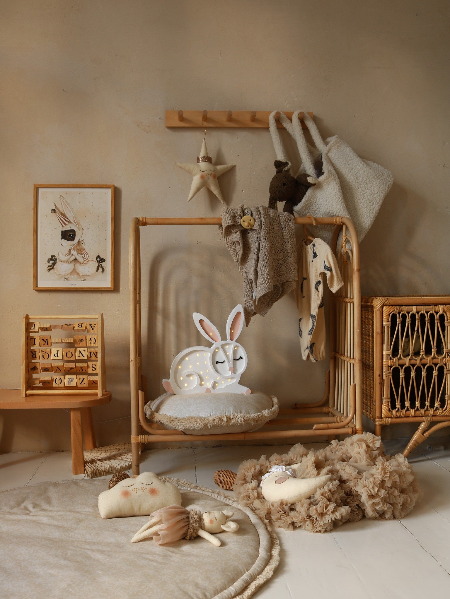 elegant solid pinewood bunny lamp casting a soft ambient glow on a modern nightstand