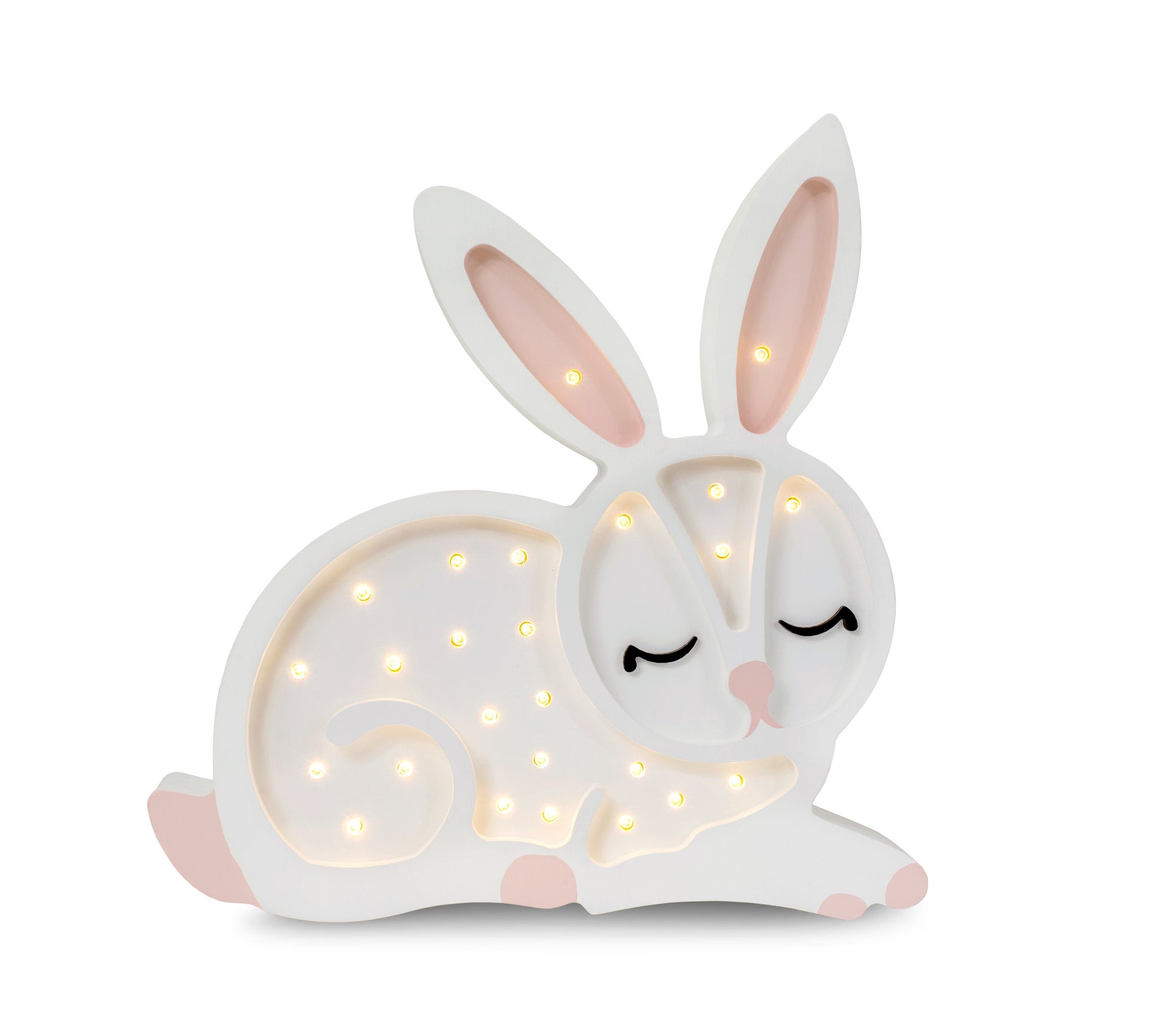 handmade pinewood bunny lamp casting a soft glow in a cozy nursery corner
