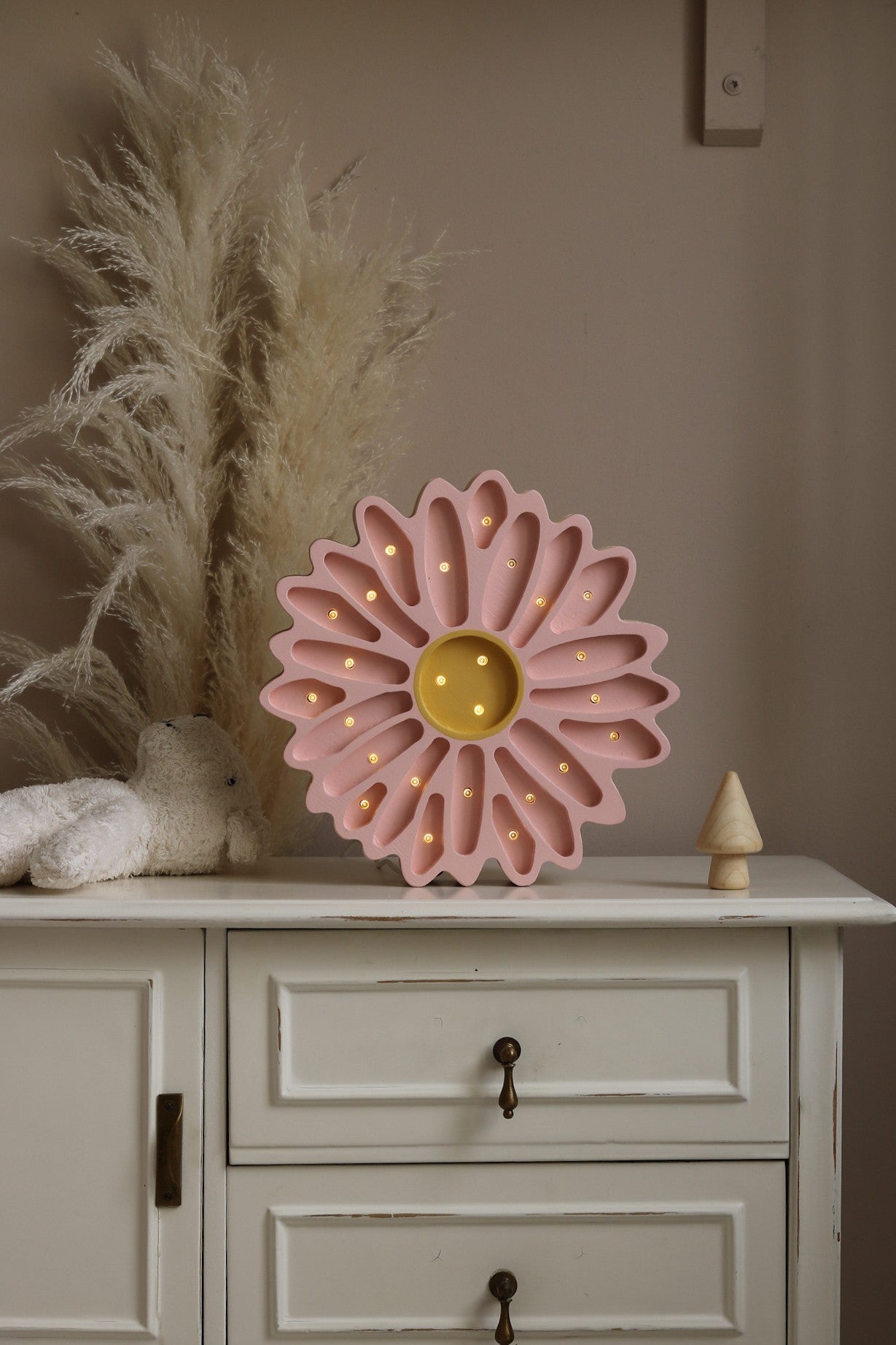 functional daisy lamp with adjustable dimmer and timer on a childs nightstand
