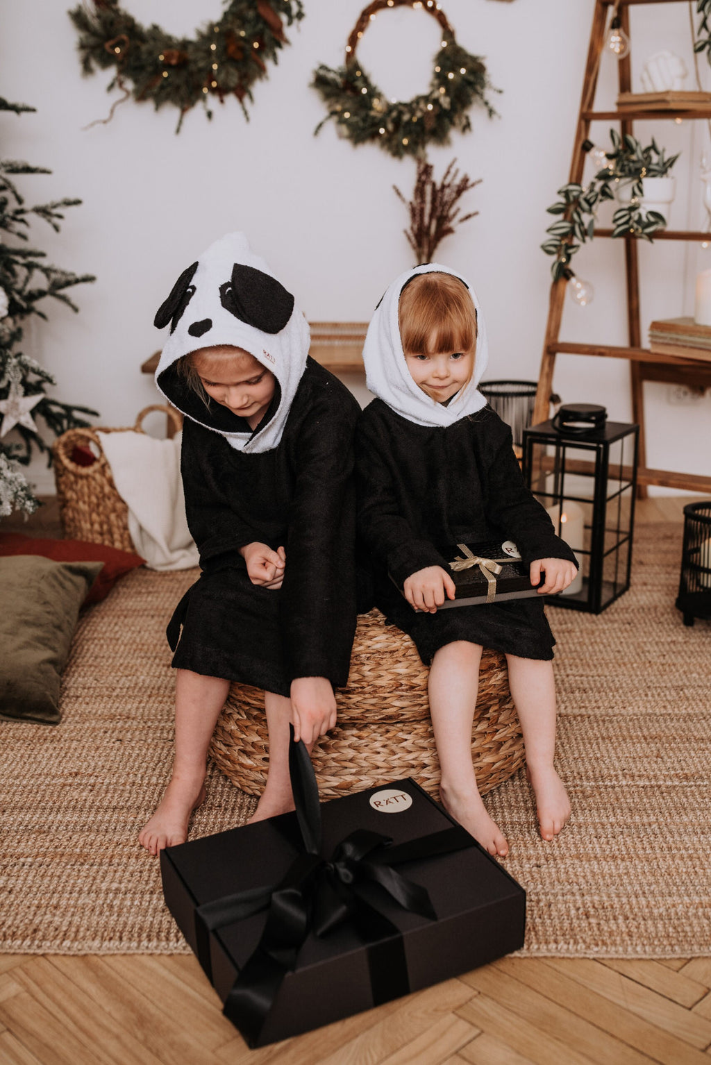 soft bamboo kids poncho with panda hood in gentle morning light