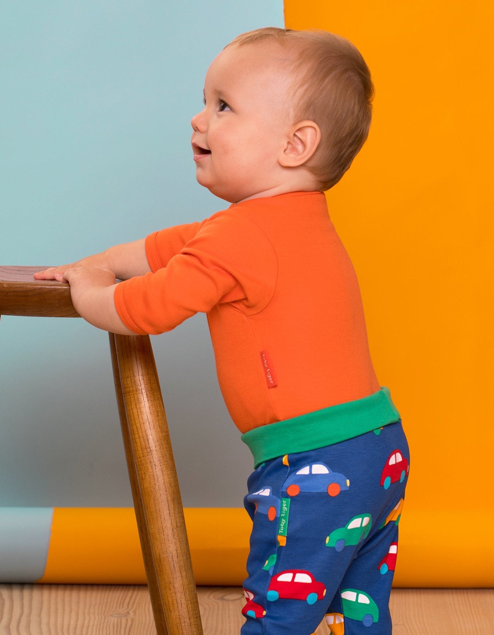 Organic Orange Long Sleeved Baby Bodysuit