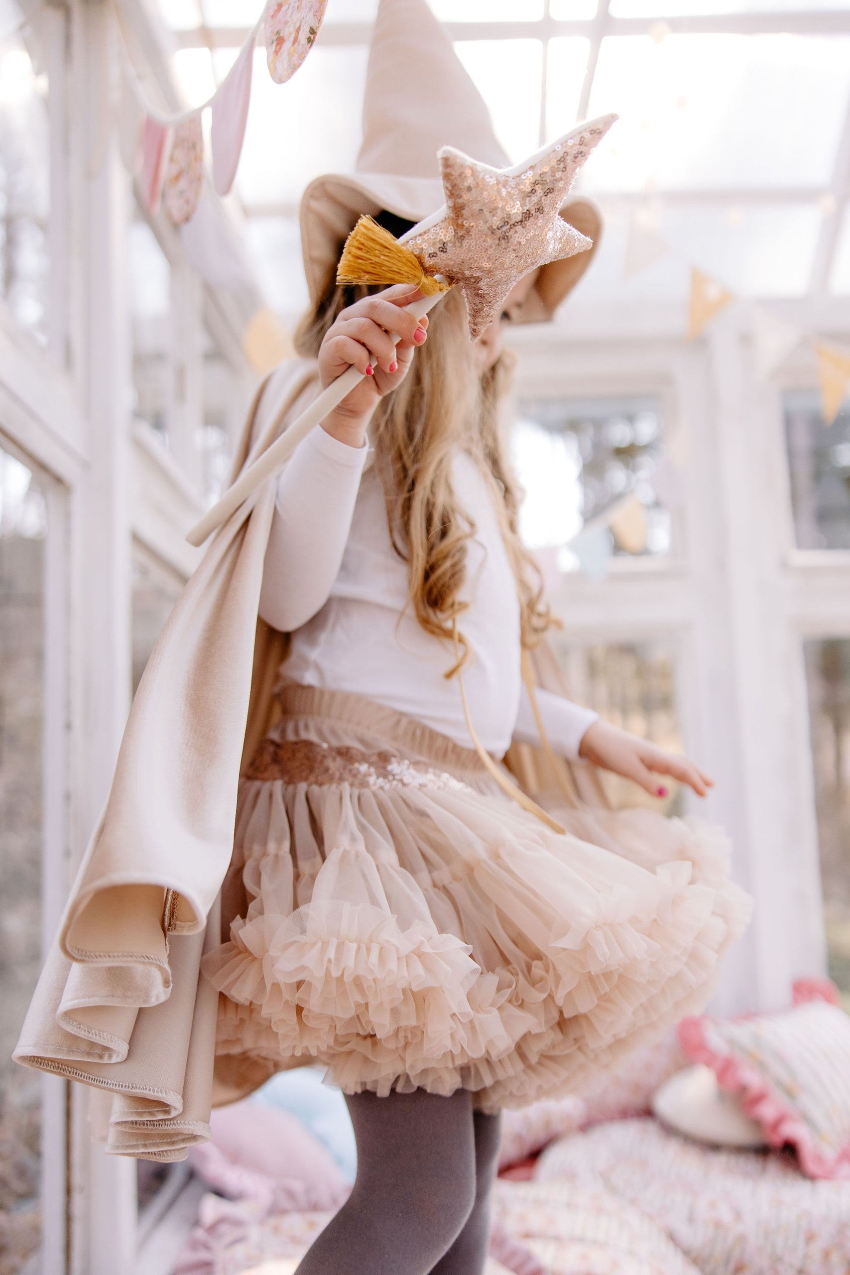 soft cream pearl magic cape with a cozy hood, perfect for a child's quiet imaginative play